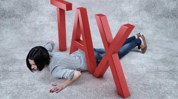 Featured | girl under big letters | Are Tax Resolution Services Legit? | tax resolution