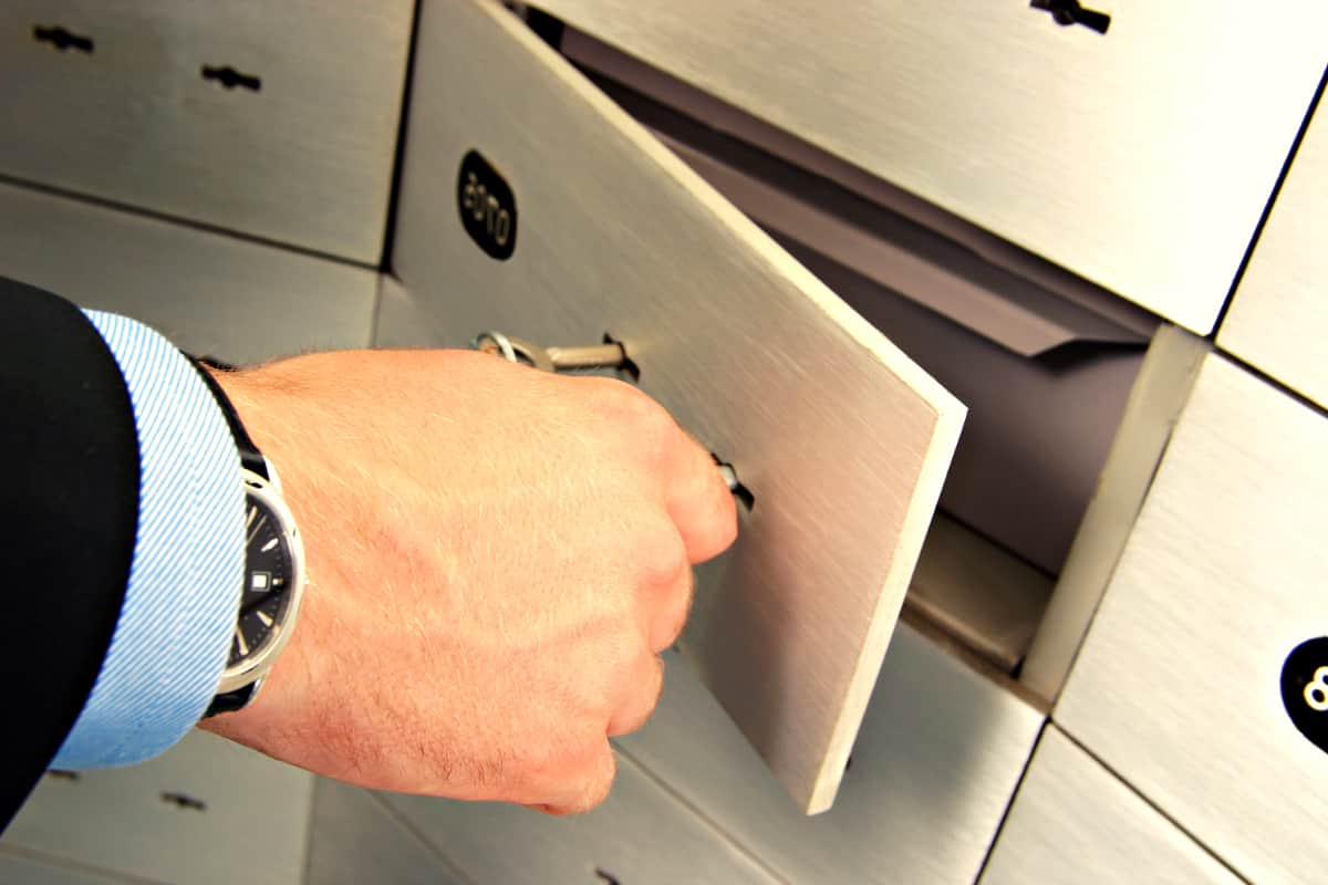 man opening a safety box | The Master List of All Types of Tax Deductions | types of tax deductions | medical tax deductions