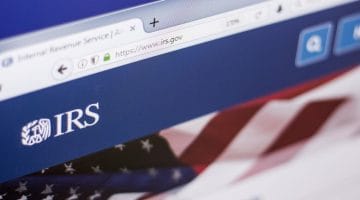 Featured | Homepage of Internal Revenue Service website on a display of PC | How To Check Your IRS Payment Plan Balance | Tax Relief Center | irs payments