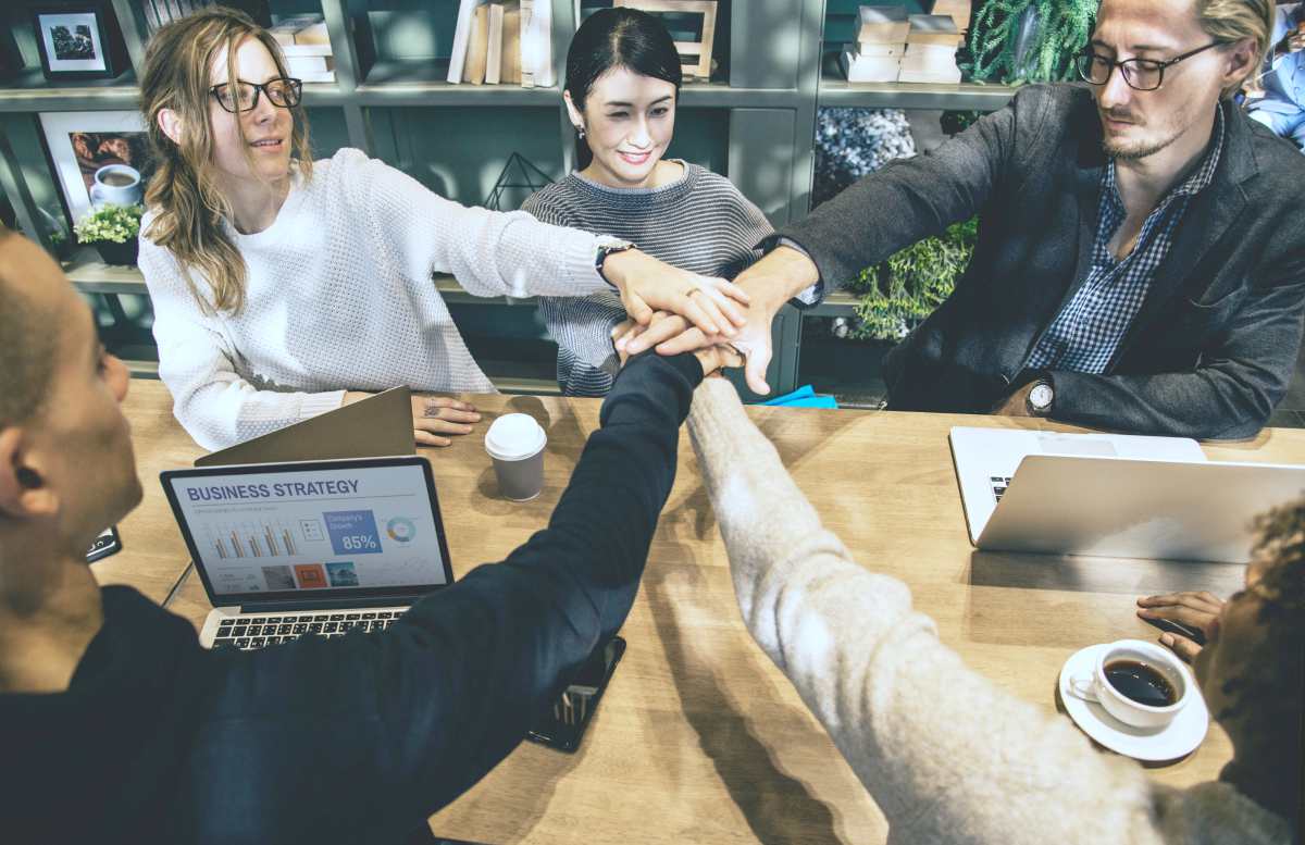 group of people holding hands | Tax Deductions and Tax Writeoffs Guide | Tax Writeoff Blog Roundup | What Is Tax Deductible?