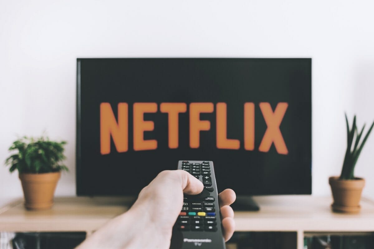 person watching netflix | Simple and Practical Frugal Living Tips You Can Start Doing Today