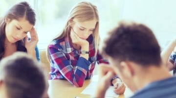 Feature | group of people studying | How Do Education Tax Credits Work? | adjusted gross