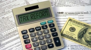 Feature | calculator and cash | New Tax Reform Act Of 2018 Explained