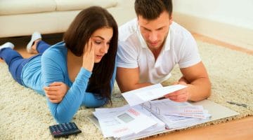 Feature | couple worried about bills | Tax Relief Tips You Can Do When You’re In Tax Trouble | Tax trouble