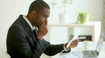 Feature | man shocked with mail | Currently Not Collectible | IRS Status | cnc