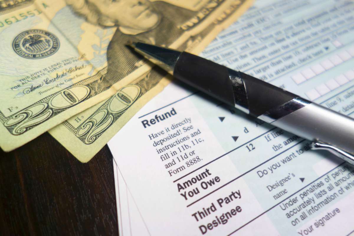 refund form and money | What's The Penalty For Filing Taxes Late? | what is the penalty for filing taxes late