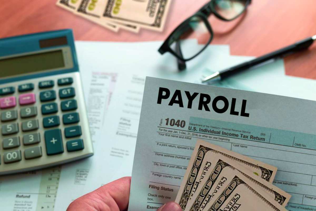 Payroll businessman working financial accounting | Different Types Of Taxes We Pay In The US | taxes