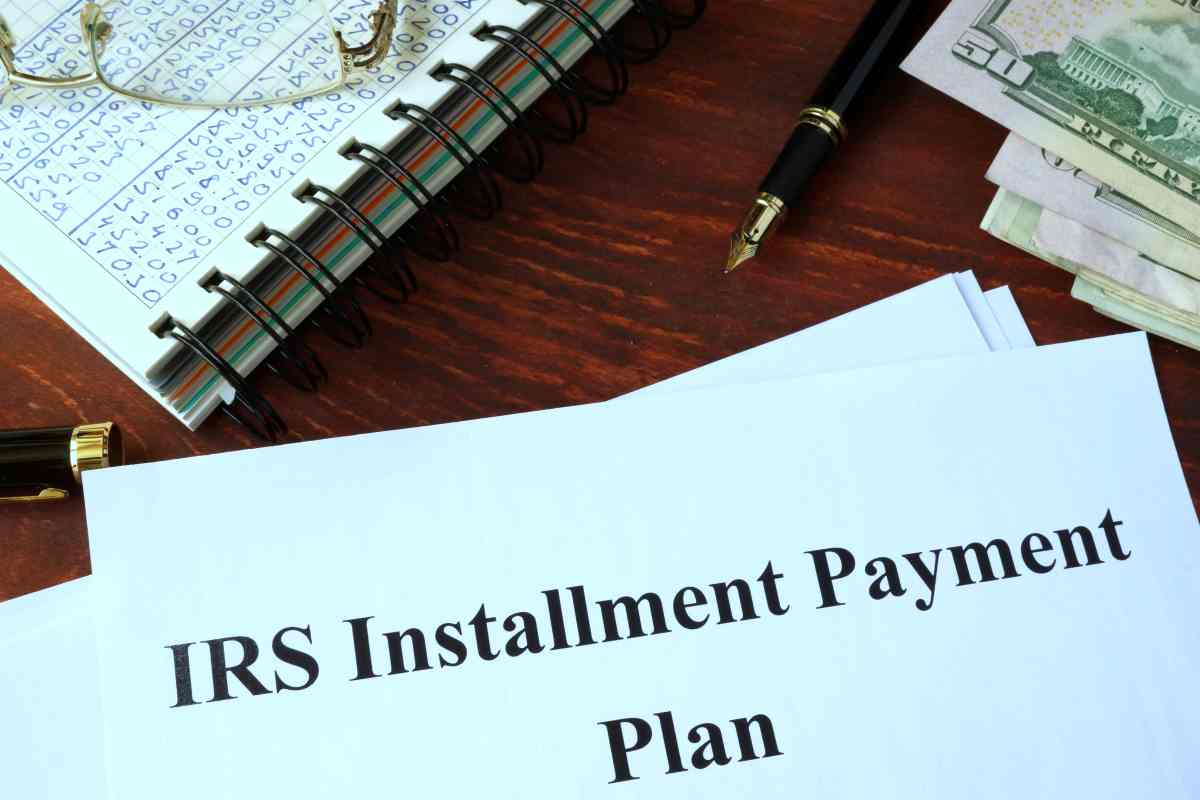 IRS Installment Payment Plan written on paper | Understanding the IRS Collections Process To Quickly Resolve Taxes | Irs collects taxes