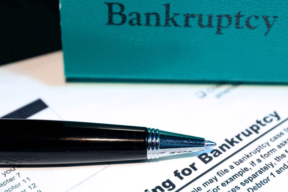 pen and bankrutcy written | Should You Consider Filing For Bankruptcy? | how to file bankruptcy