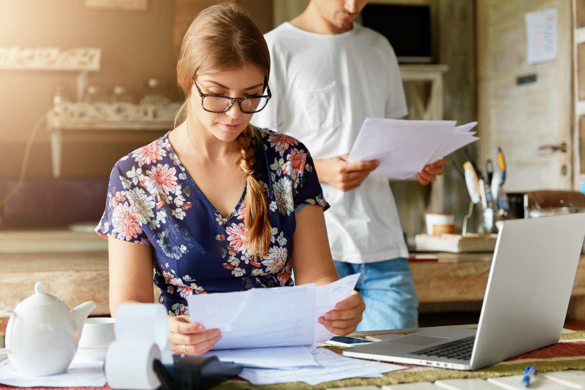 couple preparing documents | Top Reasons To Appeal An IRS Tax Lien And How To Do It | Irs office of appeals