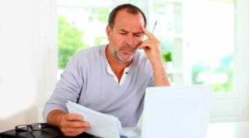 Feature | senior man thinking | Top Reasons To Appeal An IRS Tax Lien And How To Do It | collection due process hearing