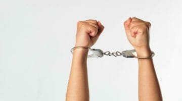 Feature | handcuffs | Can You Go To Prison For Not Paying Taxes? | can you go to jail for not paying taxes