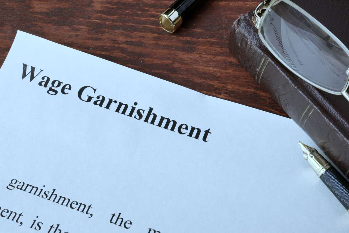 wage garnishment written on paper | What To Do If The IRS Wage Garnishment Is Causing Hardship | financial hardship