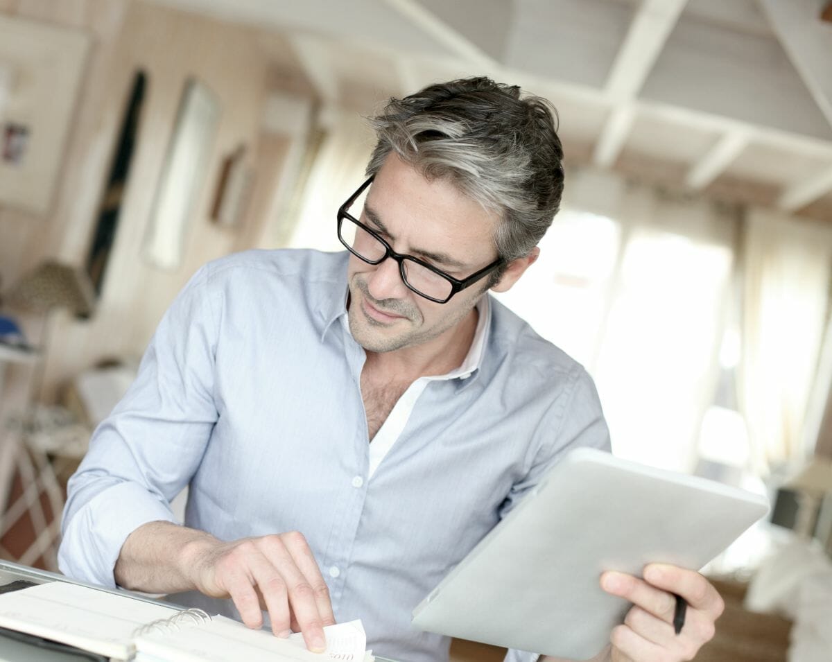 businessman working at home | Tax Considerations According To Type Of Business Ownership | types of business ownership | entity type